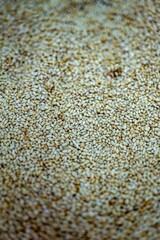 Vertical closeup shot of details on a pile of sesame seeds