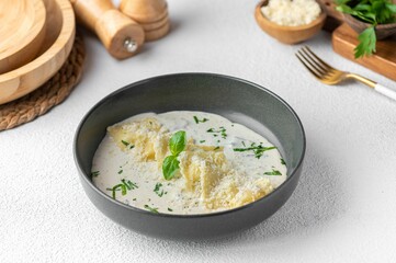 Homemade italian ravioli pasta, stuffed with spinach and ricotta