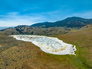 View of Spotted Lake, saline, alkaline lake located in Osoyoos in valley in British Columbia, Canada
