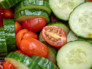 Chopped cucumbers and tomatoes. Salad with cucumbers and tomatoes. close-up.
