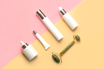 Set of cosmetics and jade massanger roller for skin care. Skin care products concept