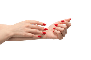 Woman hands with red nails isolated on a white background.