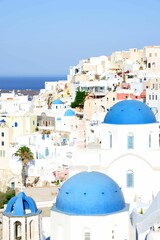 Vertical shot of the beautiful white Santorini in Greece