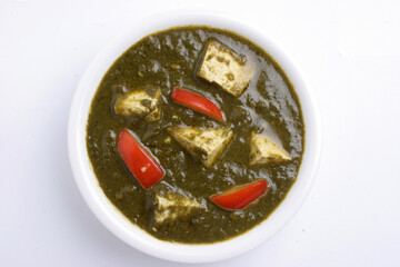 Palak paneer curry on a bowl 