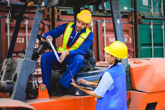Industrial engineer worker working at overseas shipping container yard