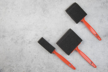 foam paint brush black sponge - Powered by Adobe