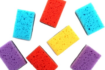 Background of multi-colored bright sponges for washing dishes.