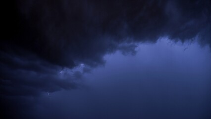 Fototapeta na wymiar Night storm clouds with lightning