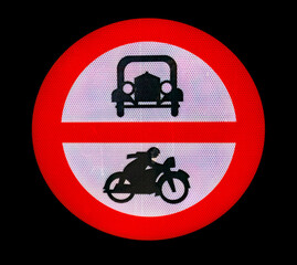 Traffic signs forbidden passage for cars and motorcycles on black background, old symbols
