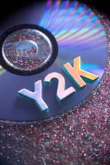 Deurstickers Y2K Letters on Music CD with Glittery Background © ecbphotos