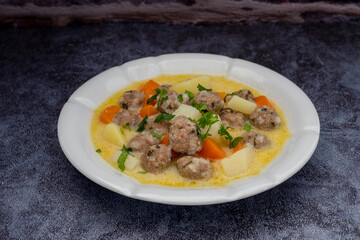 Seasoned soup with meatballs with vegetables. Turkish name; sulu kofte, eksili kofte, terbiyeli kofte)