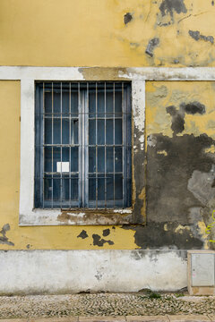 Old and chipped facade in Lisbon, Portugal