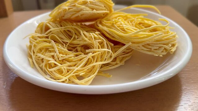 Italian pasta (tagliatelle) in a cinematic view
