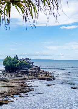 beach and rocks and temple in bali,indonesia