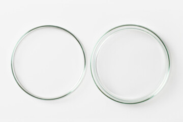 set of Petri dishes on a light background.