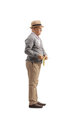 Elderly man measuring his waist