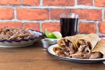 Arabian tacos with corn tortilla, typical food from the region of Puebla, Mexico, with the...