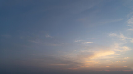 Obraz premium Sunset sky. Abstract nature background. Dramatic blue with orange colorful clouds in twilight time.