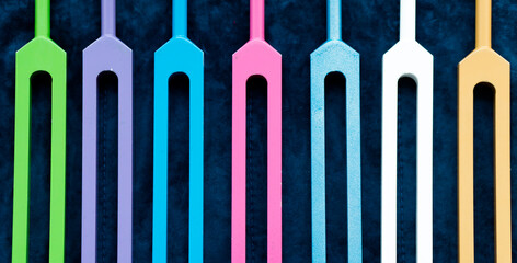 Tools for sound healing - colorful tuning forks