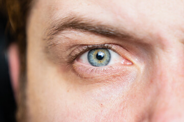 Close up of man with colorful eye