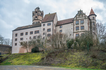 Fototapeta na wymiar Beautiful Ronneburg Castle on a hill during cloudy day, Germany