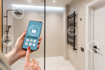 Close up smartphone in female hand with smart home system app interface on cellphone screen, young woman controlling all house system by phone in modern apartment, internet of things concept.