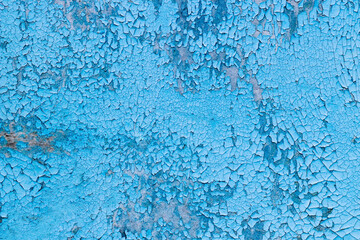 Blue texture of old cracked paint, grunge background.