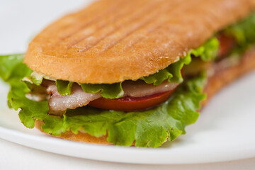 sandwich with ham and vegetables