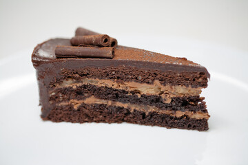 chocolate cake on plate isolated on white background