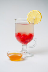 tea with cranberries isolated on white background