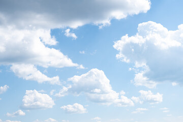 blue sky with fluffy white clouds