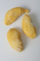 ripe durian fruit pulp close up photo isolated on white