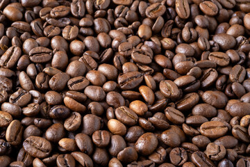 Roasted coffee beans background. Selective focus.
