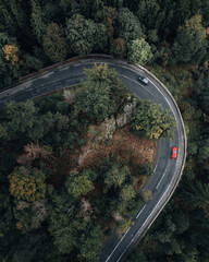 car driving around a sharp turn, top view