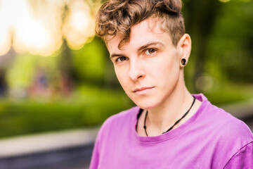 Non-binary trans lifestyle gender expression androgynous headshot portraint. hipanic diversity