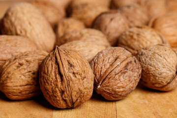 A group of tasty organic Sorrento walnuts on a wooden table
