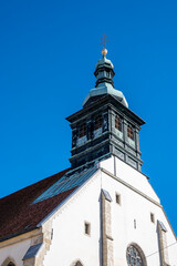 Beautiful St. Giles' Cathedral in the city of Graz, Austria with wooden and cooper tower