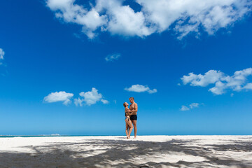 Happy Couple in Progreso beach in Mexico