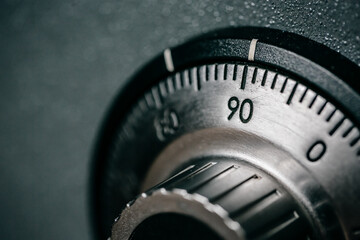 combination lock on a black background