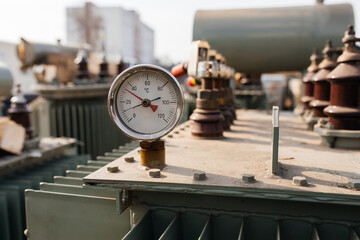 Manometers on pipes in the basement, heating system of an apartment building