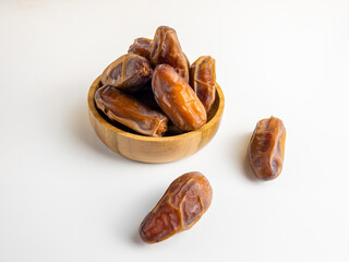 close up view of kurma, tunish dates isolated on white background