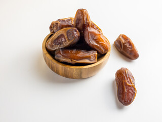 close up view of kurma, tunish dates isolated on white background