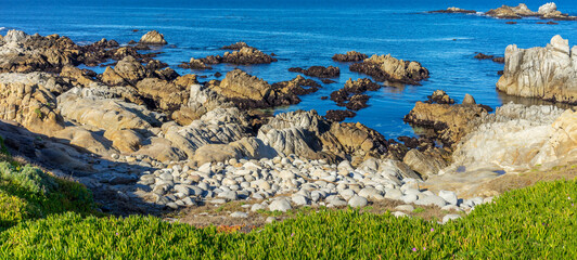 Rock formation  and ocean water on the shoreline of Monterey Bay