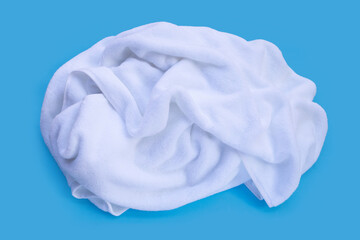 Used towel on blue background.