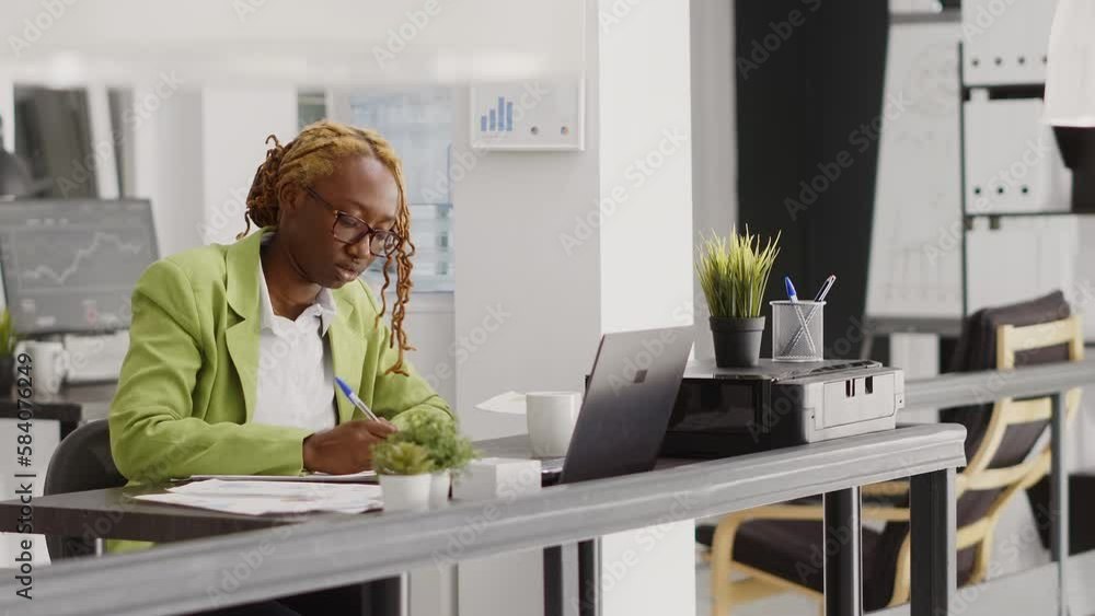 Poster executive manager taking notes on documents at desk, writing data analytics on files to increase pro