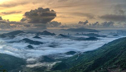 Panoramic view of Nha Trang coastal city at dawn, seen from the top of a high mountain in Vinh Phuong commune, Nha Trang City, Khanh Hoa province, Vietnam