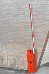 Open boom barrier outdoors on sunny day, space for text