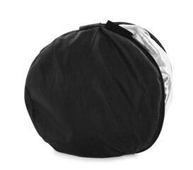 Bag with studio reflector isolated on white. Professional photographer's equipment