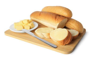 Whole and cut baguettes with fresh butter on white background