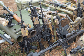 Gun weapons bags and bullets for Army marine corps soldier military war participating and preparing to attack the enemy in Thailand during Exercise Cobra Gold in battle. Combat force training.